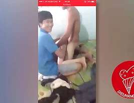A girl of Vietnamese descent participates in a group sex game that is hidden in a bingo night.