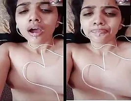 Young Indian woman stripping and exposing her breasts and vagina to her loved one.
