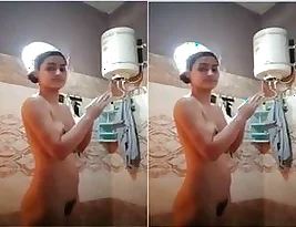 Young Punjabi girl taking a public bath with her friends and acquaintances