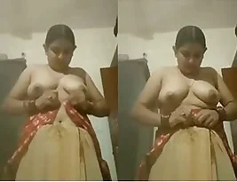 Beautiful Indian woman showing her breasts.