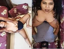 Boob pressing and riding her hubby’s dick is a hot video.