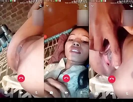 A woman from a village talks to her TikTok lover and reveals her private parts.