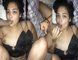 A married Indian woman has sex with her husband and her former lover.
