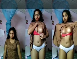Selina, a girl from Sri Lanka, strips for her boyfriend in this video.