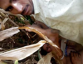 A hot scene of a married couple having sex in the woods.