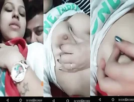 Young Indian couple pleases each other with breast fondling in live webcam adult show