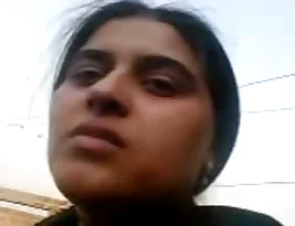 A married Indian woman gives her husband a sensual satisfaction on the roof of their house.