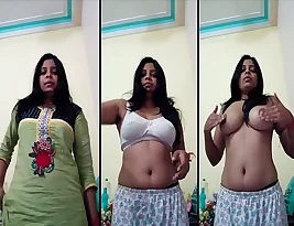 A sexy Indian woman shows off her big boobs for FSI viewers.