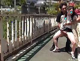 Japanese girl seems to be reluctant and at the same time enthusiastic about having sex with random man on the street