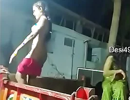 Naked Suraika dance with a tractor