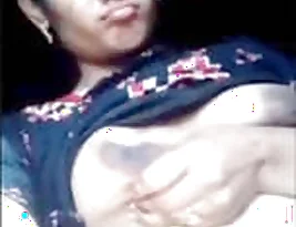 Beautiful girl plays with her boobs for her boyfriend