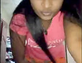 A Indian genotype takes a selfie in her office.