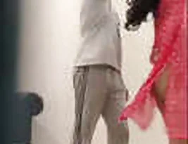 Beautiful Indian housewife shows her ass and flirt with fireworks.