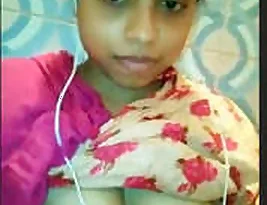A beautiful and charming girl from the East shares her breasts and vagina