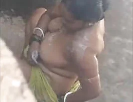 Hidden camera captures Indian bhabhi during her intimate bath time.