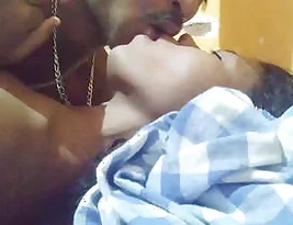 A Sri Lankan wife gives her husband oral sex and rides him while pleasuring herself.