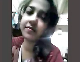Ahot Indian woman undresses herself in this video.