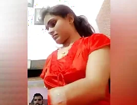 Hot Indian girl strips and performs phone sex.
