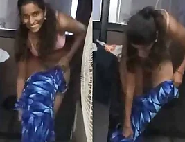 Indian girl altering her dress