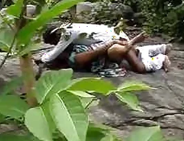Beautiful woman enjoys hot outdoor sex