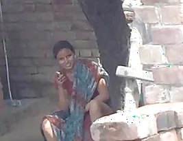 A female farmer from a rural area exposing her genitals to her next door neighbour.