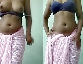 Beautiful Indian girl shows off her big boobs on webcam.