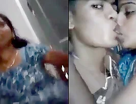 A Indian married woman (Bhabi) seductively shows her bare genitals and enjoys kissing with her lover.