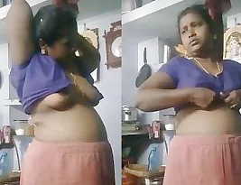 Beautiful Indian girl in hot clothes change her outfit.