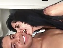 An Indian beauty is seductively kissing and blowjobing a man’s penis.