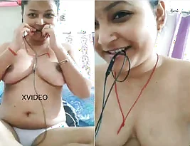 Hot Indian woman strips and reveals her breasts and vagina in part 2.