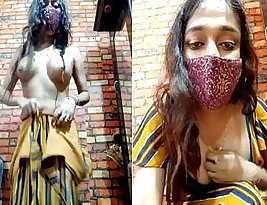 Beautiful Indian woman in a solo performance of self-eros.