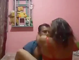A hot video of a desi couple having sex in a bedroom, and a threesome with an auntie and uncle giving blow jobs.