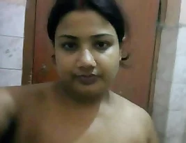 Pretty self-portrait of a busty aunt in the bathroom.