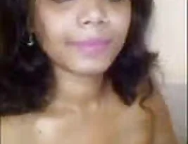 Pretty woman exposing her breasts and vagina.