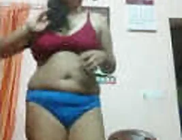 Pretty Indian woman exposing her bosom and private part.