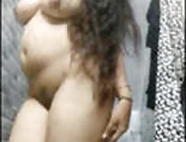 A sexy hot Indian college girl strips and dances.
