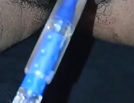 Young Indian college girl with a pen for writing and pleasure.