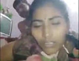 A mature woman seduces her stepson from behind.