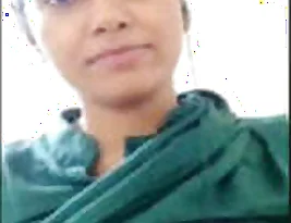 A girl from India is flashing her breasts and private part.