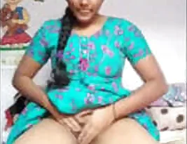 Pretty Indian woman strips.
