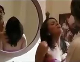 Beautiful wife of a police officer in hot Indian movie scene in sauna